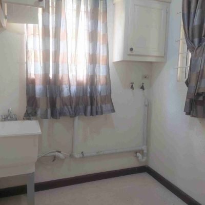JRE LLyods Court Rental Laundry Room scaled