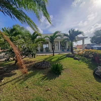 villa for sale in barbados front lawn